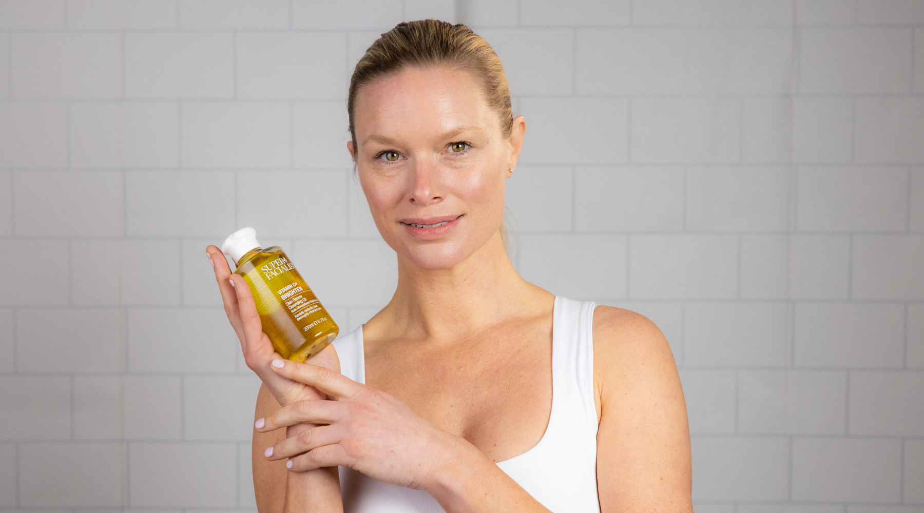 charlotte connoley holding vitamin c skincare cleansing oil