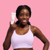 Model holding Rosehip Day Cream