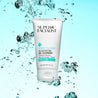 white cleanser tube in water surrounded by bubbles