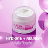 Open jar with white cream inside. "Hydrate + Nourish with Rosehip" text overlay.