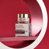 Hexapeptide 9 eye cream jar on top of carton packaging inside circular prop in front of red background