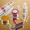 Full super facialist hexapeptide 9 range on a gold table with creamy swatches around the products