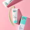 Daily Moisturiser green swatch next to moisturiser tube on pink table
