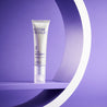 Retinol anti ageing serum tube inside a white circle prop