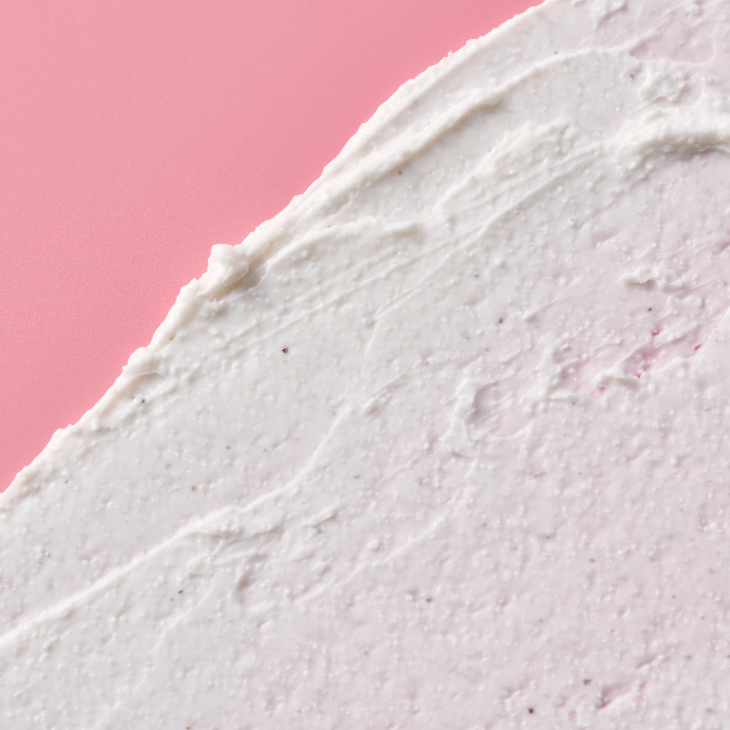 Facial scrub up close image of the creamy texture with microbeads