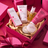 Full Rosehip range placed inside a pink giftbox with gold silk material inside