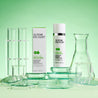 Salicylic acid gel moisturiser and carton packaging in front of glass containers